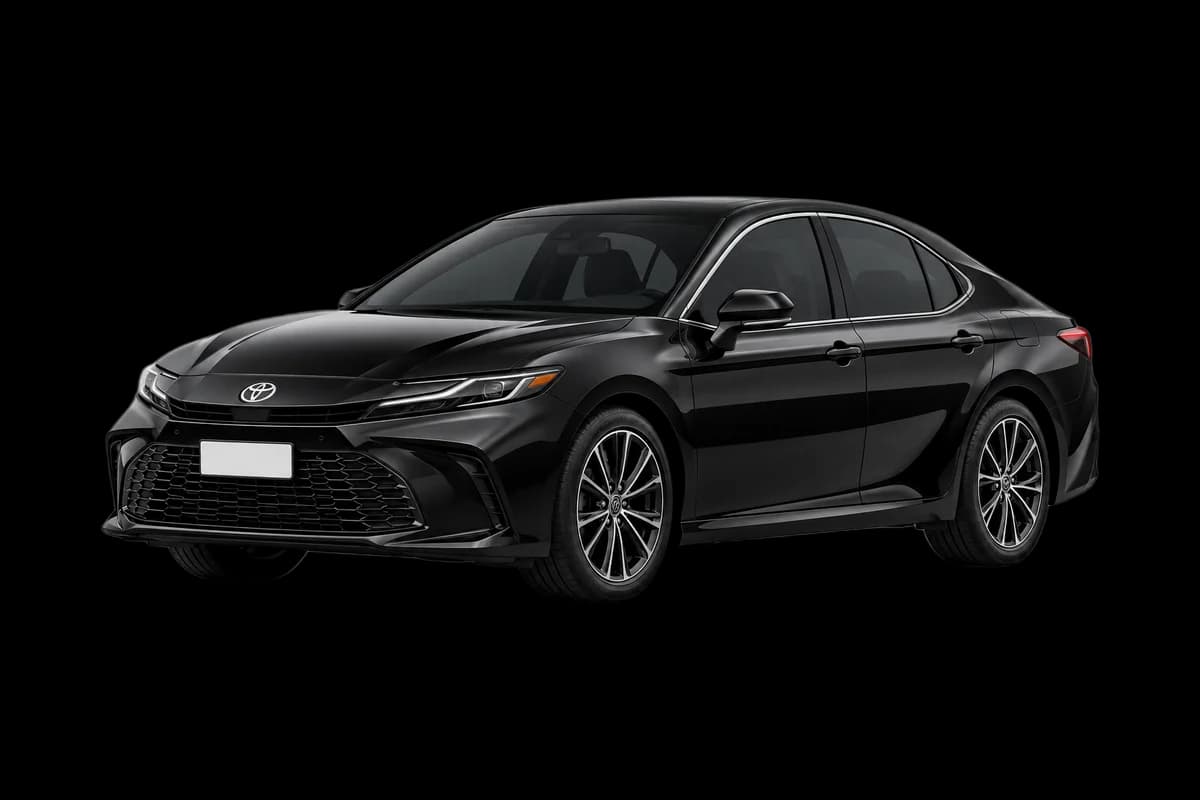 Black Toyota Camry sedan used for Umrah taxi transfers in Makkah and Madinah